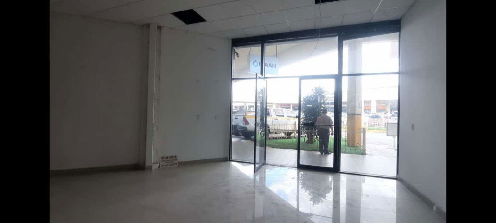 Retail storefront with large glass doors and windows Pueblo Nuevo Panama City