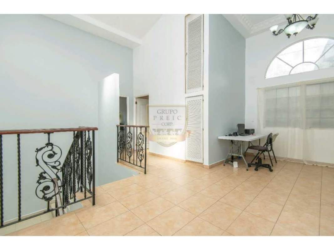 Colorful children playroom with tile floor and chandeliers in large Villa de las Fuentes home Panama