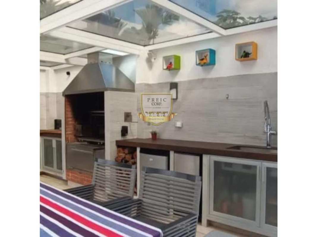 Bedroom with accent wall, ceiling fan, split AC Costa Sur Panama