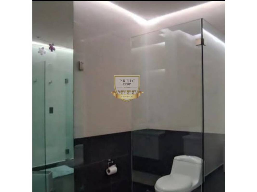 Outdoor kitchen with BBQ grill, pizza oven covered by glass roof Costa Sur Panama house