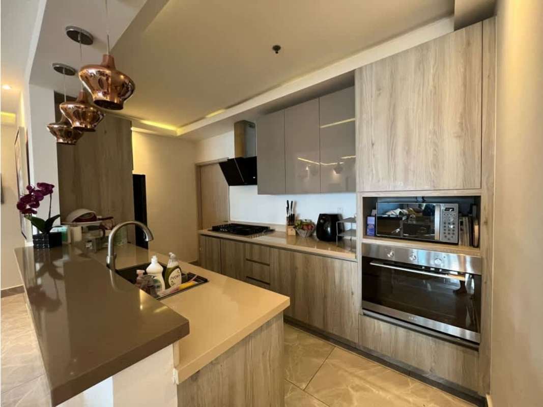 Fully equipped modern kitchen with stainless appliances and granite counters PH Premium Tower Panama City