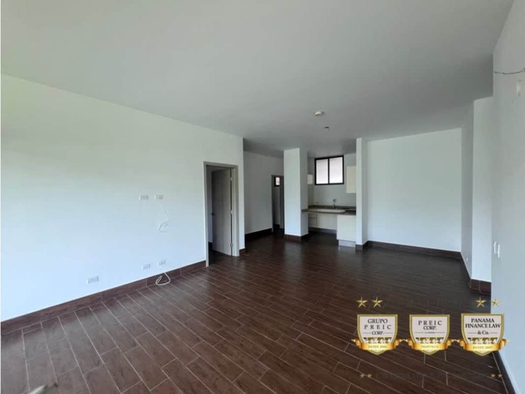 Bright living and dining room with tile floors in PH CostaMare Costa Sur Panama