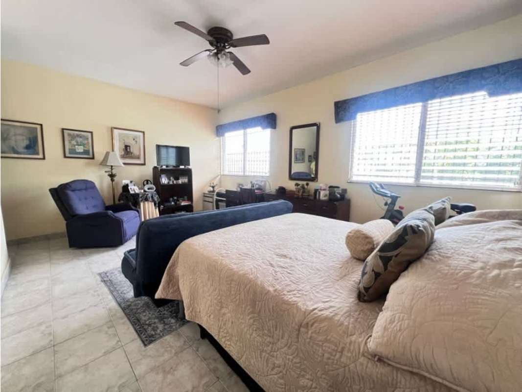 Spacious covered terrace overlooking garden and pool in Los Angeles Betania house Panama City