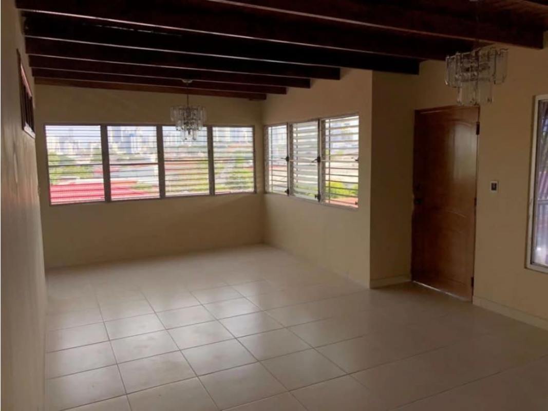 Living room with louvered windows, ceiling beams Betania Panama house for sale