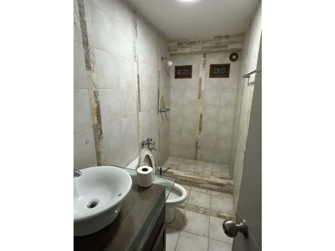 Modern bathroom with walk-in shower and vessel sink PH Mirador Obarrio Panama