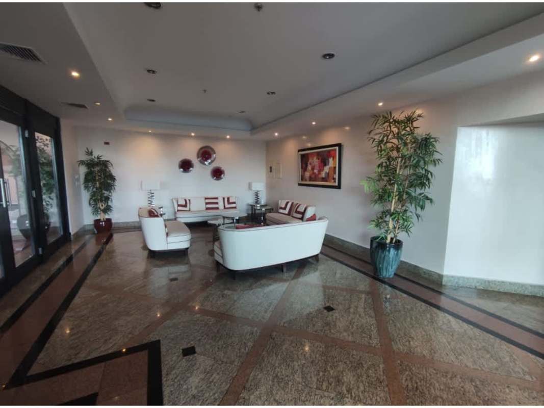 Spacious open plan living and dining room with ceramic floors and AC at PH Vista Marina Panama City