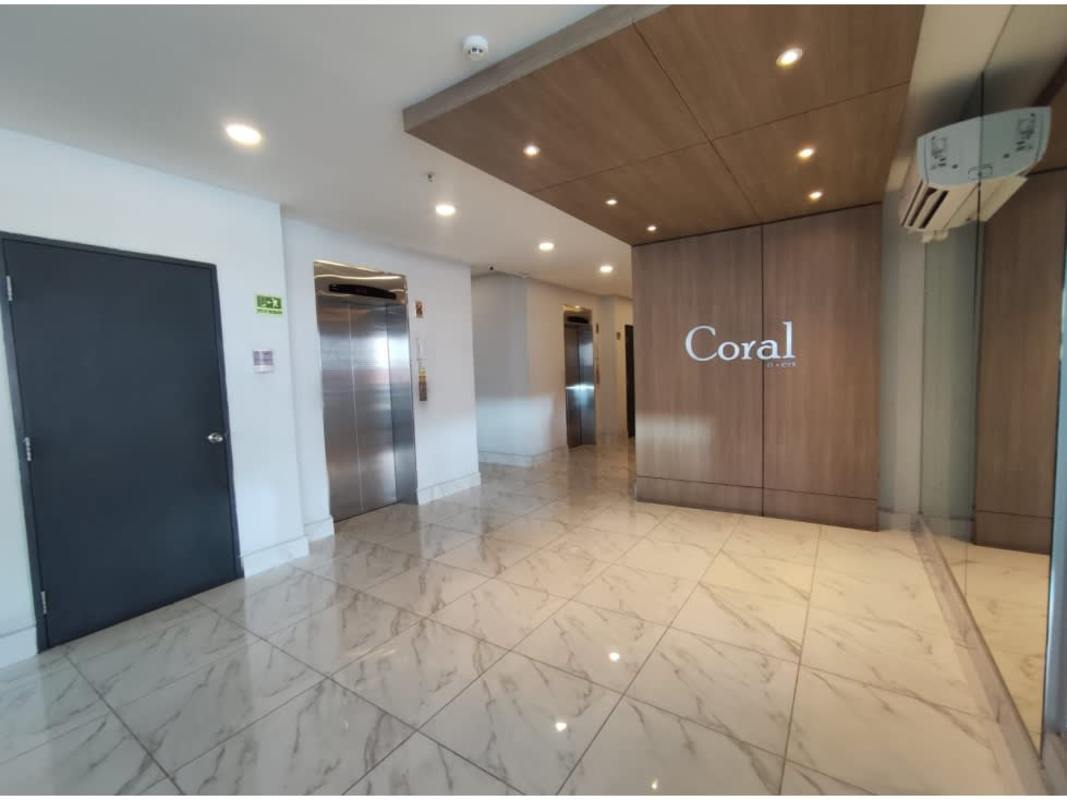 Minimalist bedroom with window and city skyline view apartment Coral Tower Carrasquilla Panama