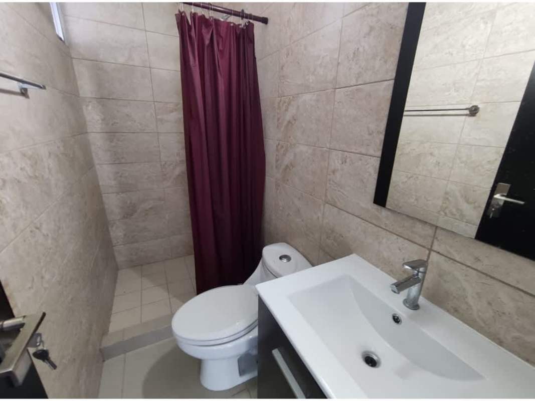 Modern bathroom walk-in shower vanity tile walls Panama apartment Coral Tower Carrasquilla