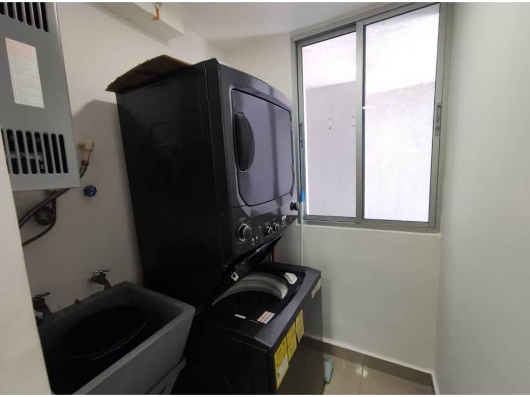Compact laundry room with washer dryer connection utility sink window ventilated Coral Tower Carrasquilla Panama