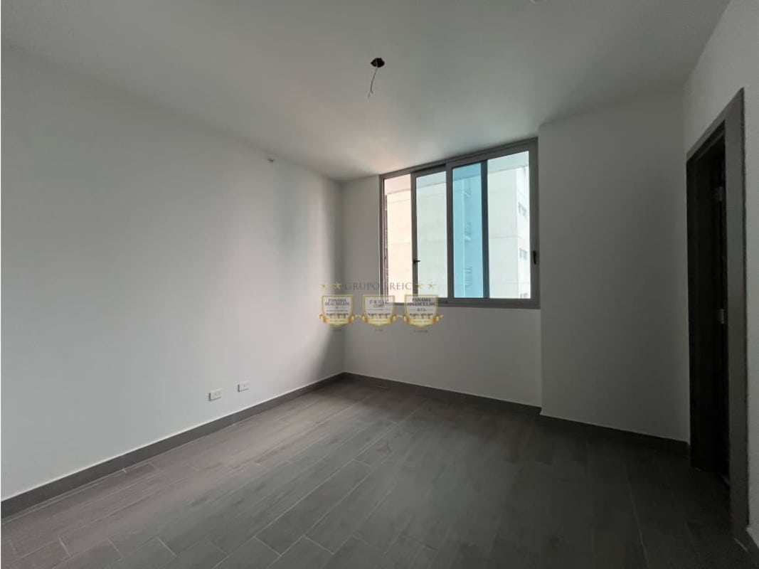 Bedroom featuring large window ceramic floor modern design PH Regalia Panama