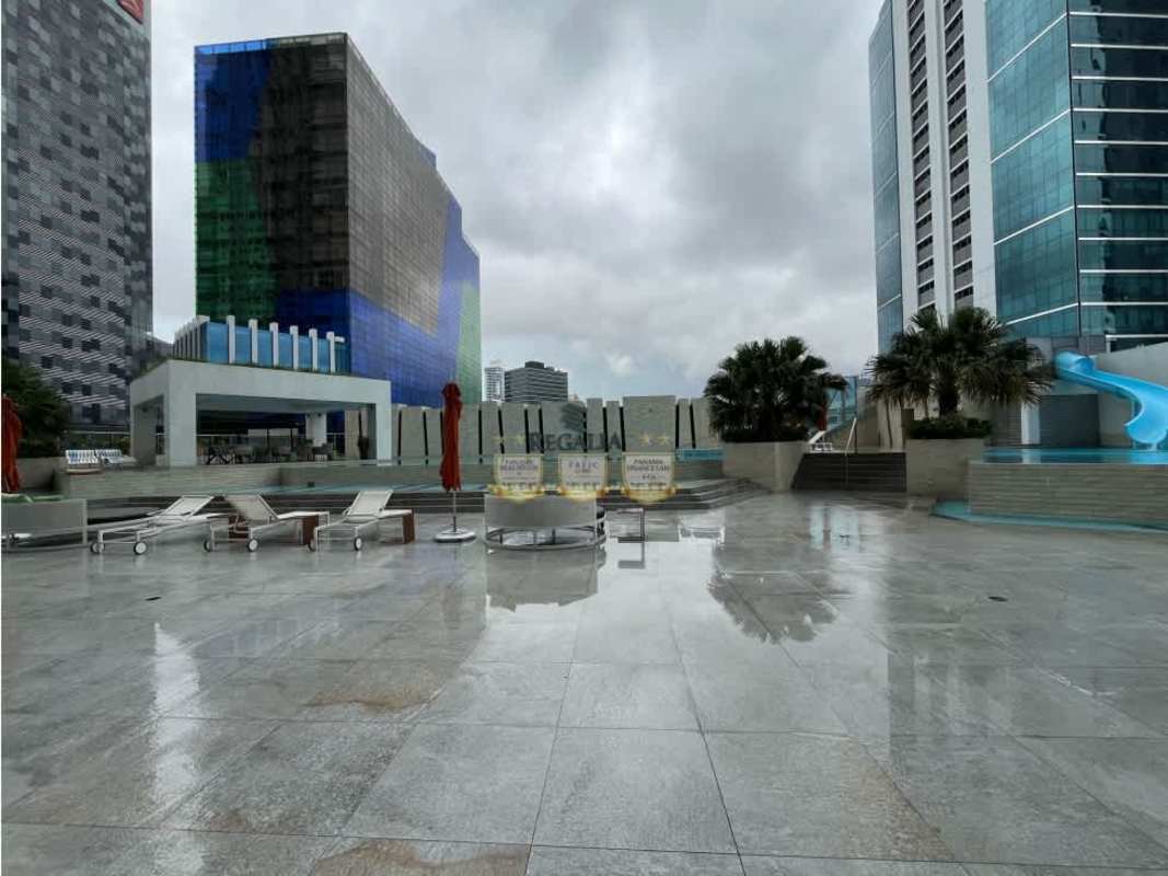 Modern lobby with wooden panels lighting and Regalia illuminated logo Costa del Este Panama