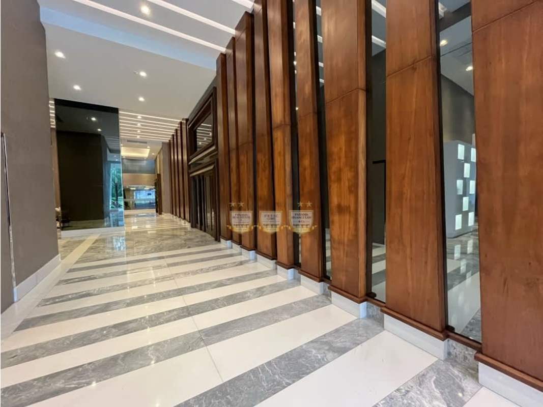 Living room with marble floors floor-to-ceiling windows panoramic Costa del Este views PH Regalia