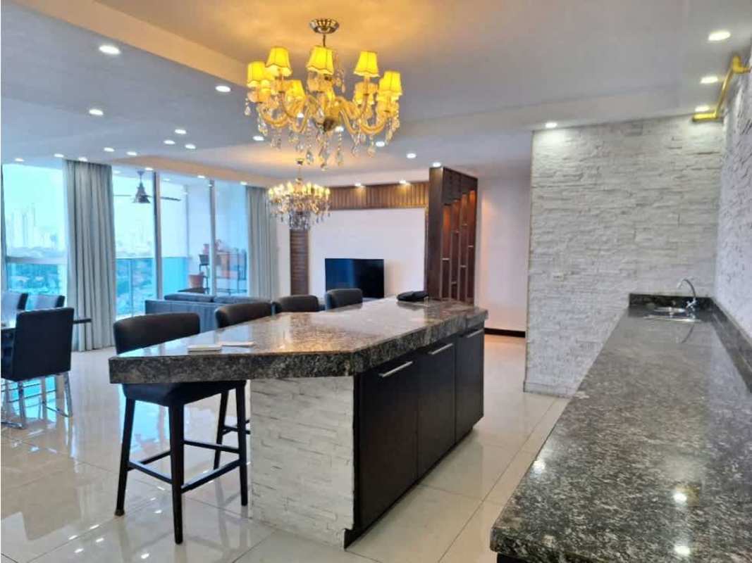 Dining area with granite dining table and chandelier at PH Waterfalls Panama