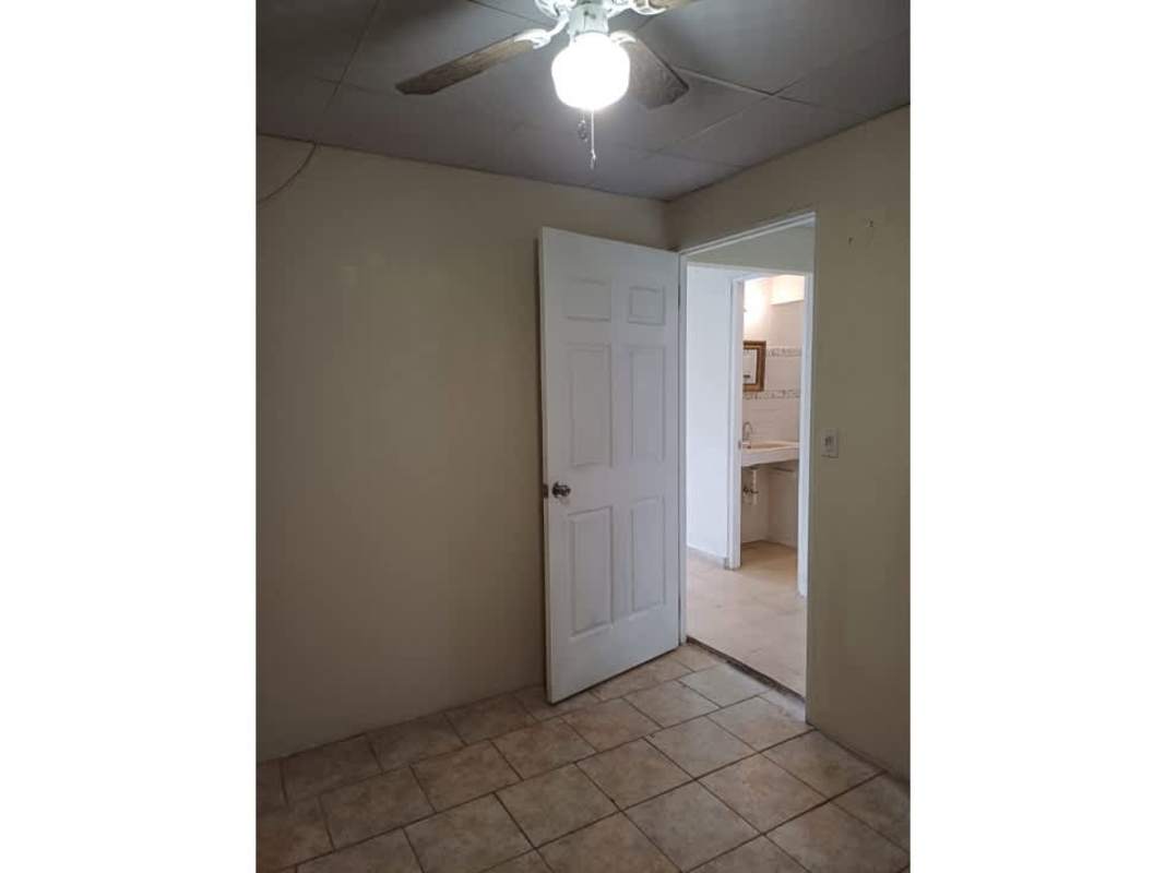 Bedroom with attached bathroom tile floor ceiling fan Don Bosco Panama house for sale