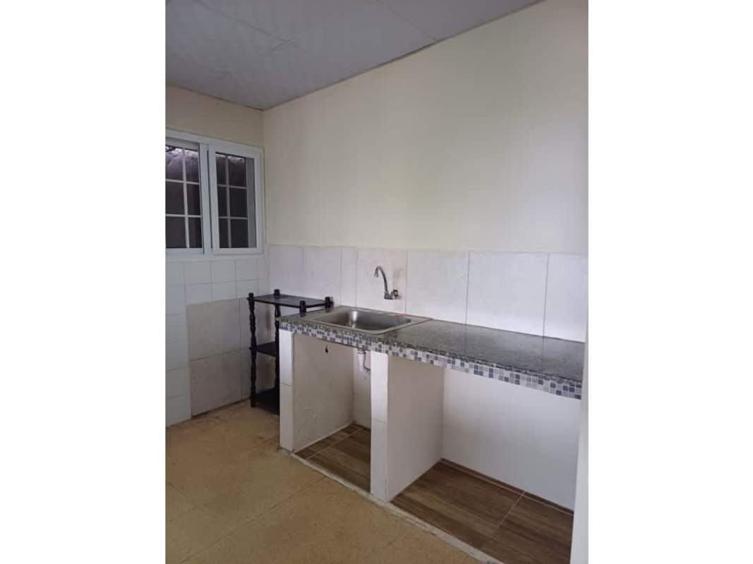 Small kitchen granite countertop window tiling Don Bosco Panama house sale