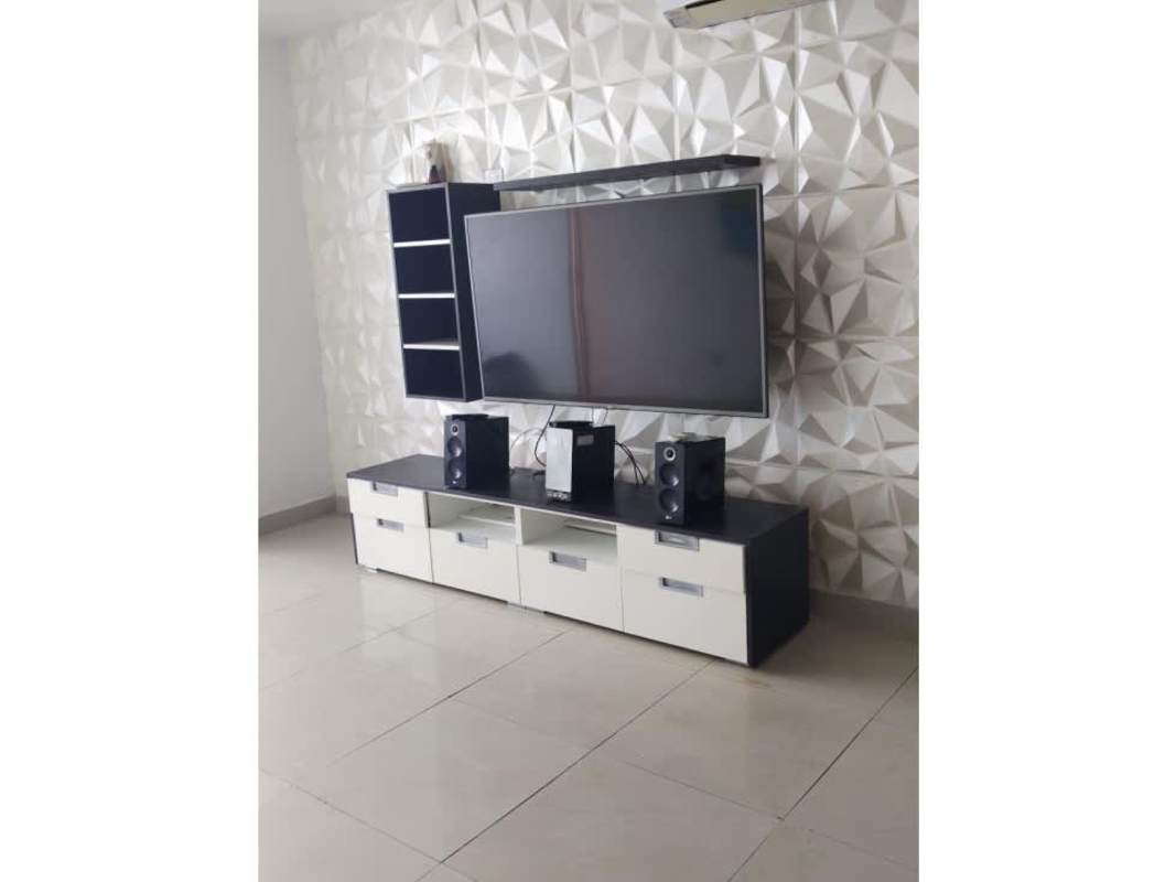 Bright bedroom with large window and minimalist decor in PH Calle 77 Panama City