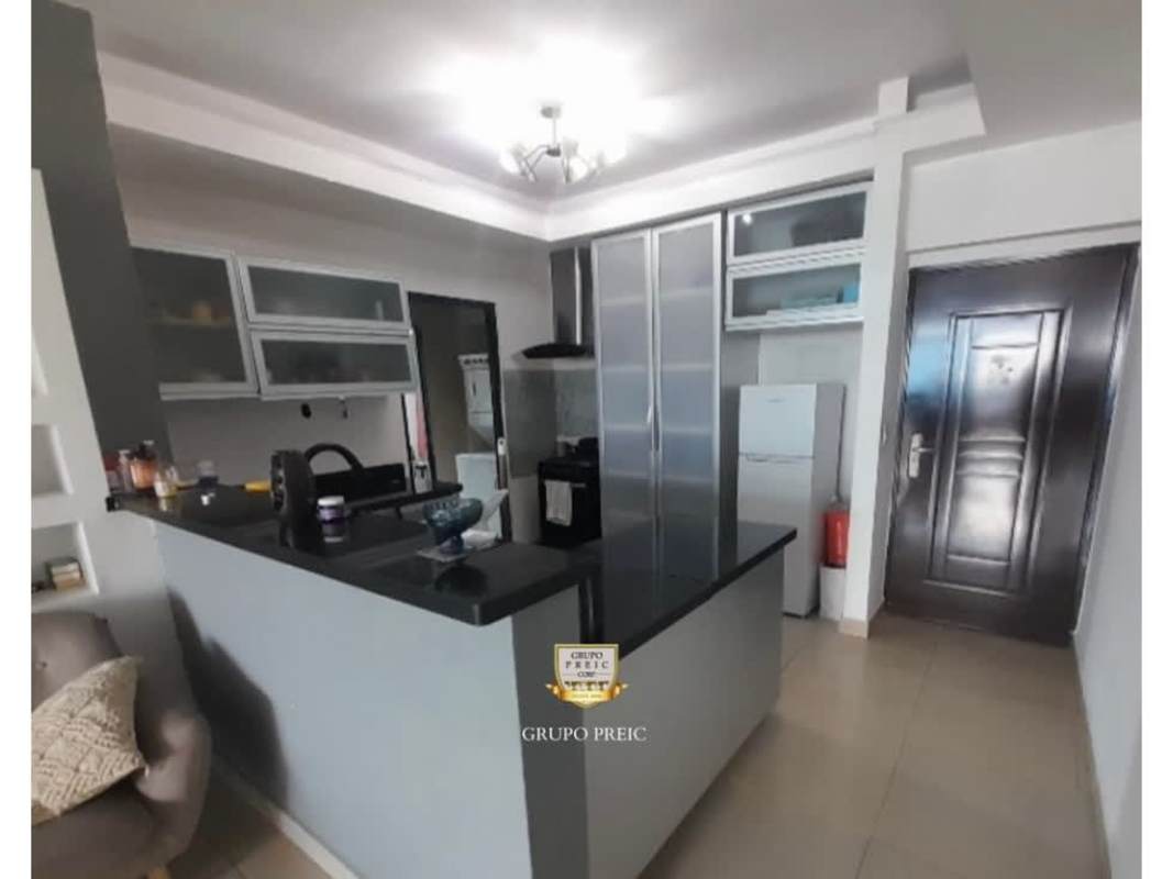 Living room with textured wall panel, TV, contemporary design PH Calle 77 San Francisco Panama