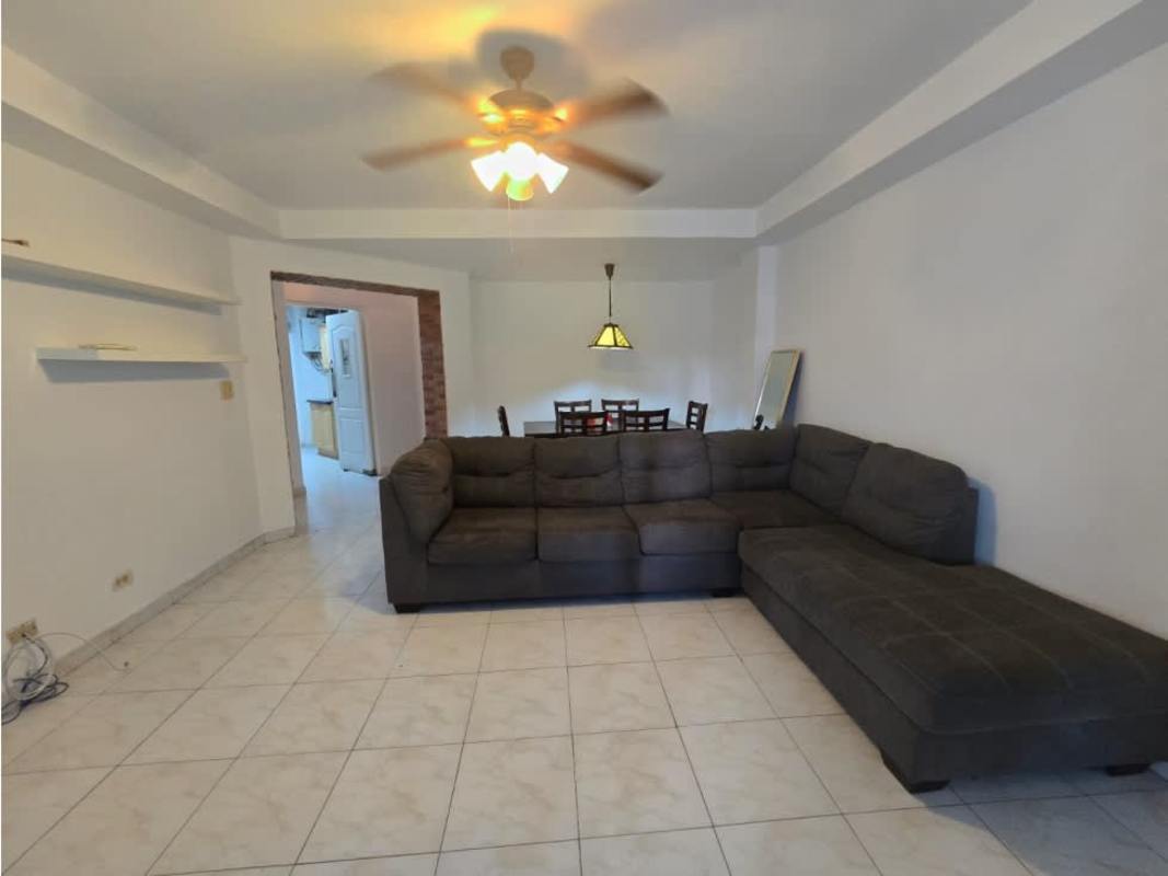 Kitchen with granite counters, wooden cabinets and appliances Clayton Tower Panama