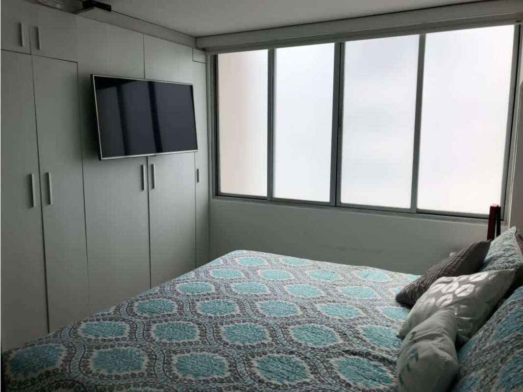 Master bedroom includes built-in closets, window with blinds, AC at PH Sky Park Carrasquilla