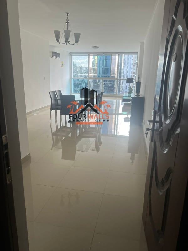 Bright dining room with glass windows and city skyline in PH The Palm Obarrio Panama