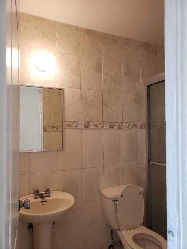 Interior hallway with tile flooring and neutral walls in apartment for sale PH Vista Hermosa Panama