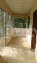 Simple interior with tiled floor and windows country house Bayano Panama