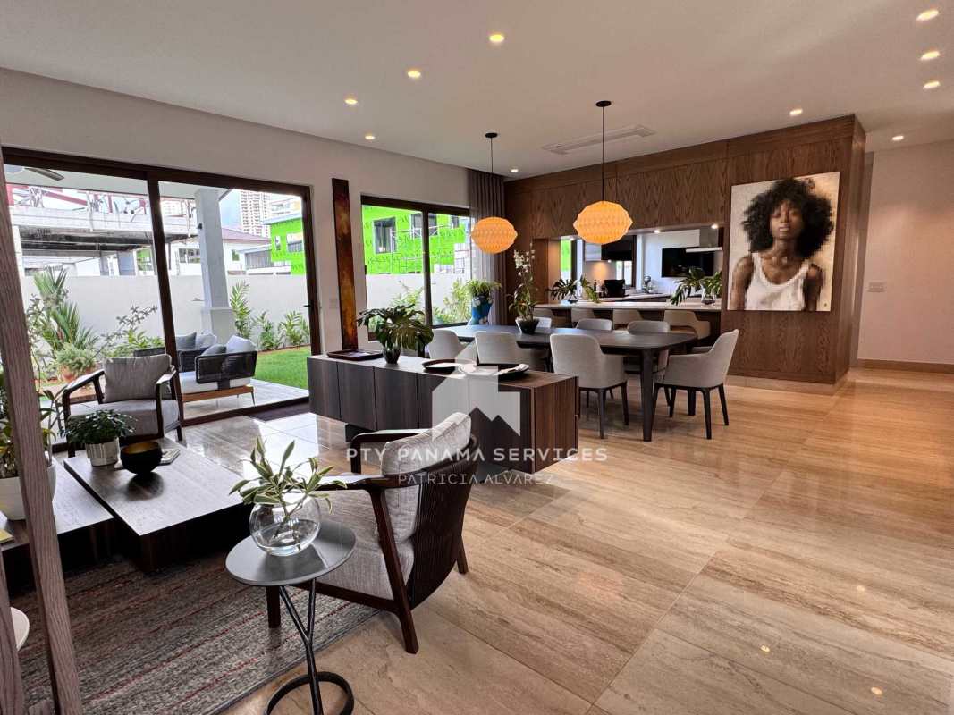 Contemporary kitchen with marble island and Italian cabinetry in Santa Maria Golf Panama luxury house