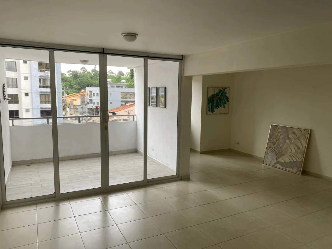 Second bedroom with large window and closet in Villa de las Fuentes Panama apartment for sale