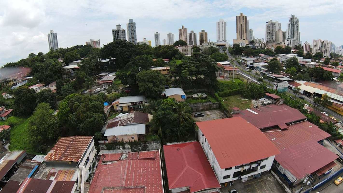 Vacant development lot located in Pueblo Nuevo behind metro with city skyline