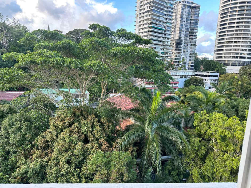 Remodeled bathroom with beige tiles and pedestal sink PH Bella Vista Garden Panama