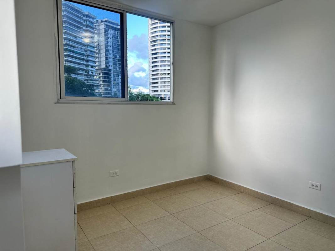 Living room with AC and tile floor in remodeled Bella Vista Garden apartment Panama