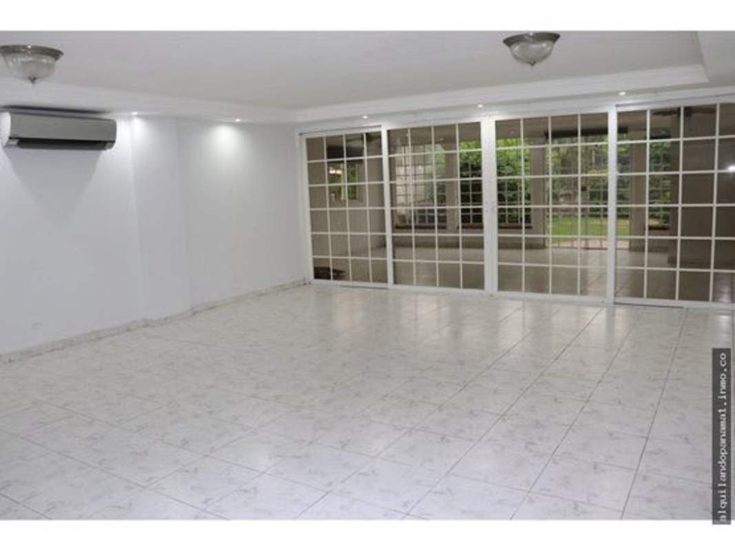Large open living space or reception with ceramic tile floor at commercial house Club X Panama