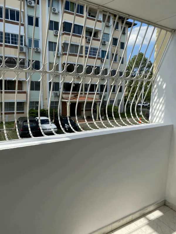 Empty bedroom with ceramic tile, built-in closet and ceiling fan in Parque del Este Don Bosco Panama