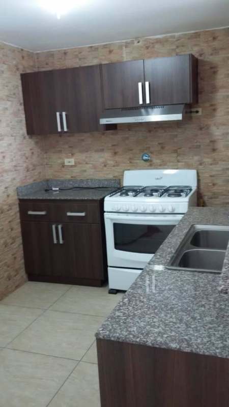 Bedroom with ceramic floor and wardrobe in Condado del Rey Panama