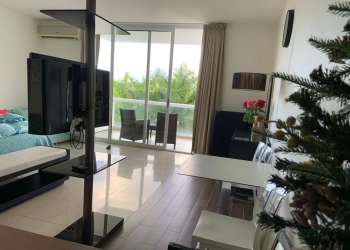 Open studio with balcony access overlooking lagoon Playa Blanca Resort