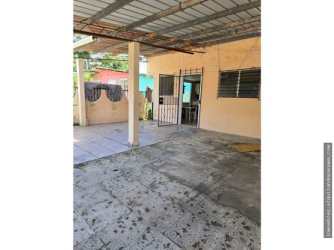 Patio with roof, gated entry, cement floors of house for sale in Vista Alegre Panama