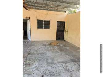 Partially covered outdoor patio area with moss growth and storage Vista Alegre Arraiján