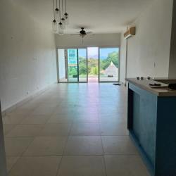 Living area with sliding glass doors to terrace, ceiling fan, tiled flooring Punta Barco beach villa Panama
