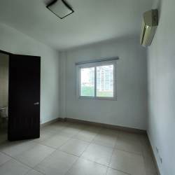 Bright bedroom with split AC, tiled flooring and window with blinds PH Punta Barco Village beach villa Panama
