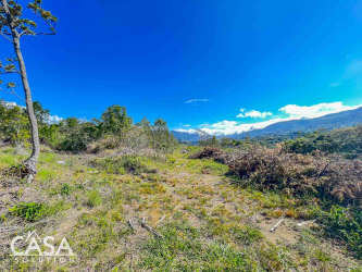 Vacant land plot with open terrain and breathtaking mountain backdrop near downtown Boquete Panama
