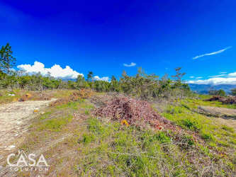 Lush green land plot overlooking mountain range in Alto Boquete Panama