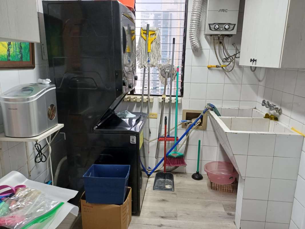 Laundry room with washer hookup, sink, and cabinets PH Royal Princess Panama