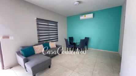 Modern bedroom with AC unit, closet, tiled in Hacienda Real furnished house David Panama