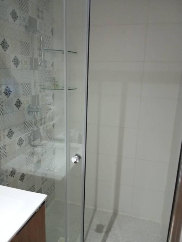 Contemporary apartment kitchen with granite countertops and stainless appliances in PH Worldwide Plaza Panama