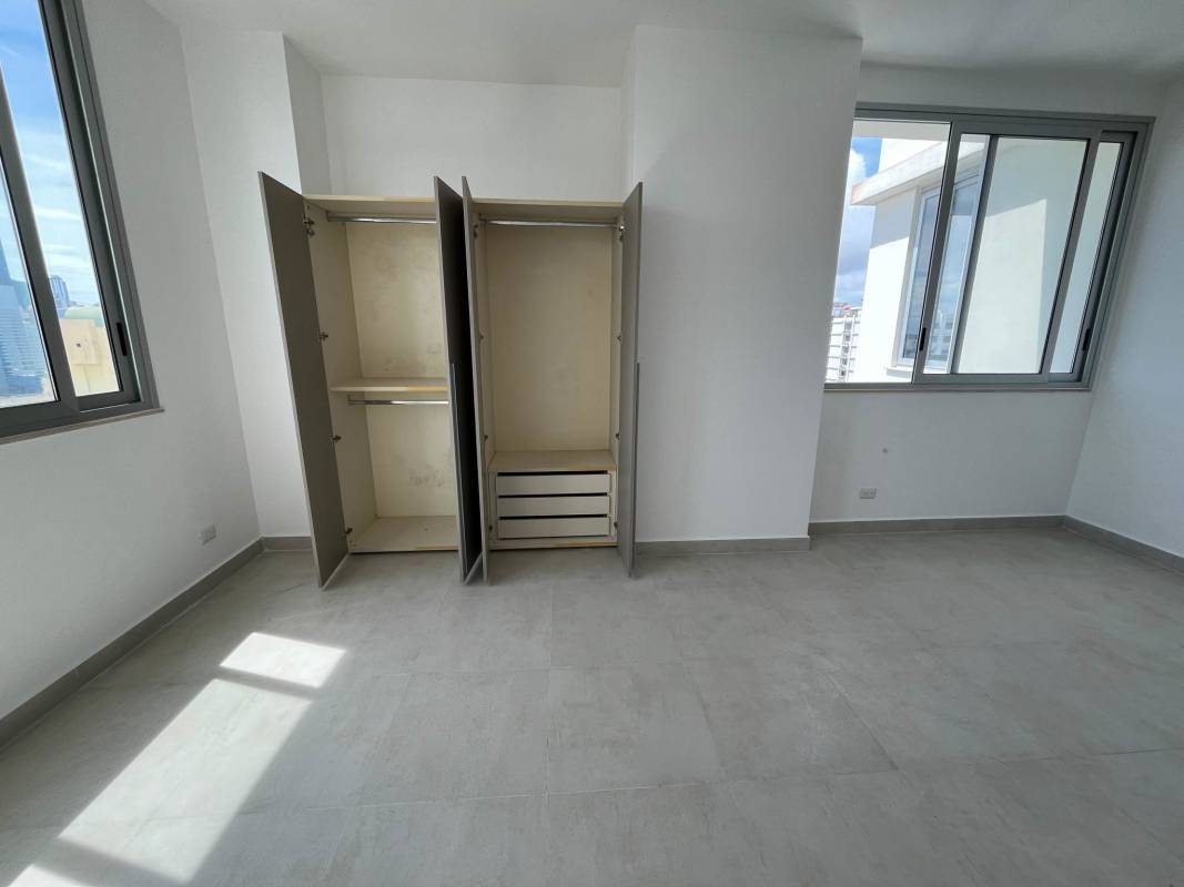 Spacious living room with natural light and city views in PH Milano Tower San Francisco Panama