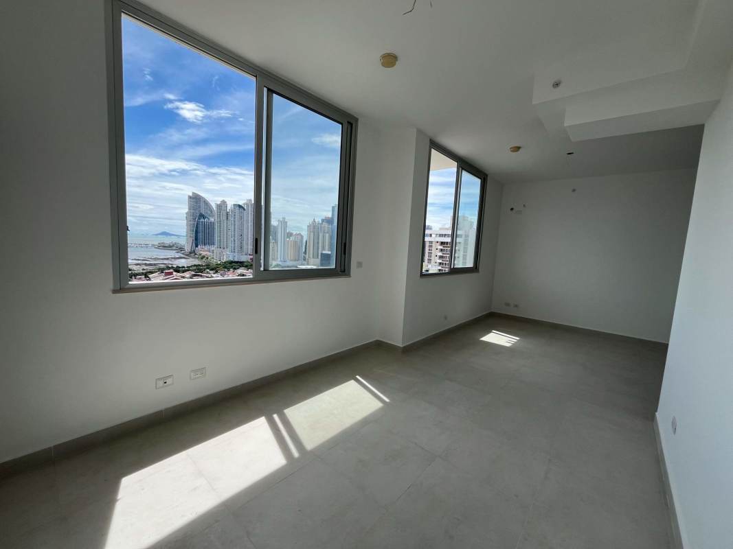 Modern bathroom with glass shower and vanity in PH Milano Tower Panama City
