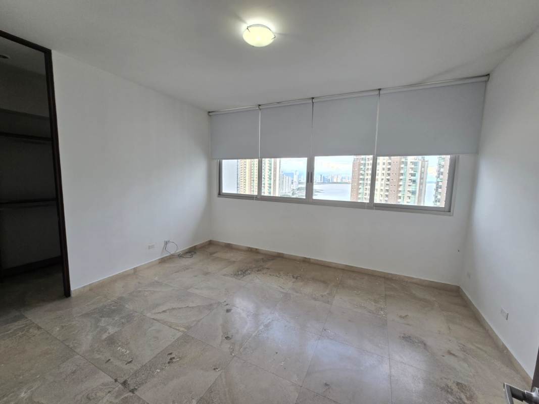 Spacious master bedroom with floor-to-ceiling windows, ocean view in PH Aqualina Panama City