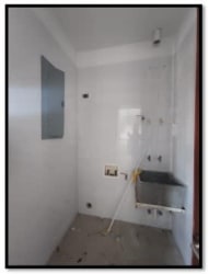 Laundry room with utility sink and plumbing fixtures PH Hoyo 18 at Vistamar Golf Beach Resort