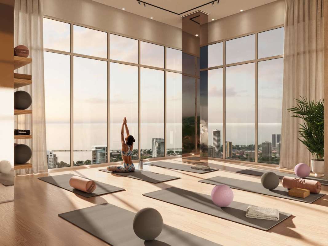 Modern yoga studio with panoramic city and ocean views at Aqua Costanera Bella Vista Panama