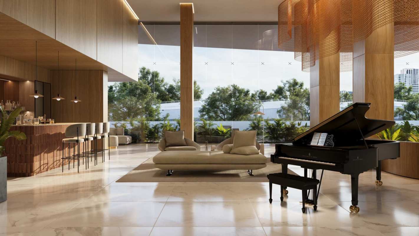 Elegant double-height lobby with piano and modern lounge seating at Aqua Costanera Panama